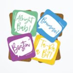 Coaster Set in green, blue, purple and yellow. the words say Slang Sayings, Dialect from birmingham