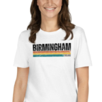 white t-shirt birmingham logo, lady brown hair wearing t-shirt